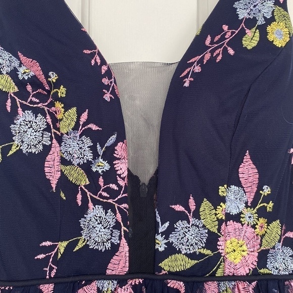 GB formal gown in navy with embroidered pink, yellow, and blue flowers. - Picture 4 of 15